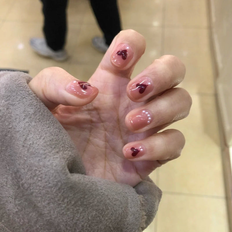 24 unidades de unhas postiças destacáveis , prensadas com gel.